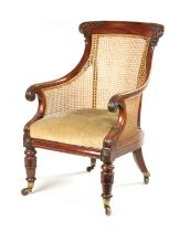 A GOOD WILLIAM V CARVED MAHOGANY BERGERE LIBRARY CHAIR WITH OLD LANCASTER PAPER LABEL - POSSIBLY GIL