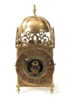 EUREKA CLOCK CO. LONDON. AN EARLY 20TH CENTURY LANTERN STYLE ELECTRIC MANTLE CLOCK