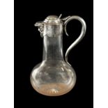 A VICTORIAN SILVER MOUNTED GLASS CLARET JUG