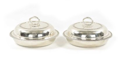A GOOD PAIR OF PAUL STORR CIRCULAR SILVER ENTREE DISHES OF LARGE SIZE