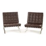 A PAIR OF 20TH CENTURY BARCELONA CHROME AND LEATHER UPHOLSTERED CHAIRS