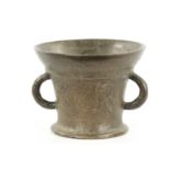 A 17TH CENTURY BRONZE MORTAR