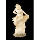 AN ART NOUVEAU CARVED ALABASTER FIGURE OF A SEMI-NUDE LADY