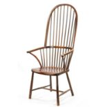 A 19TH CENTURY PRIMITIVE PAINTED STICK BACK WINDSOR ARMCHAIR