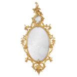 AN 18TH CENTURY CARVED GILTWOOD CHIPPENDALE STYLE HANGING MIRROR