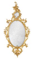 AN 18TH CENTURY CARVED GILTWOOD CHIPPENDALE STYLE HANGING MIRROR