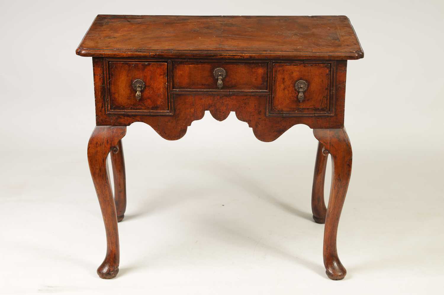 A GEORGE I FIGURED WALNUT AND HERRING-BANDED LOWBOY - Image 2 of 8