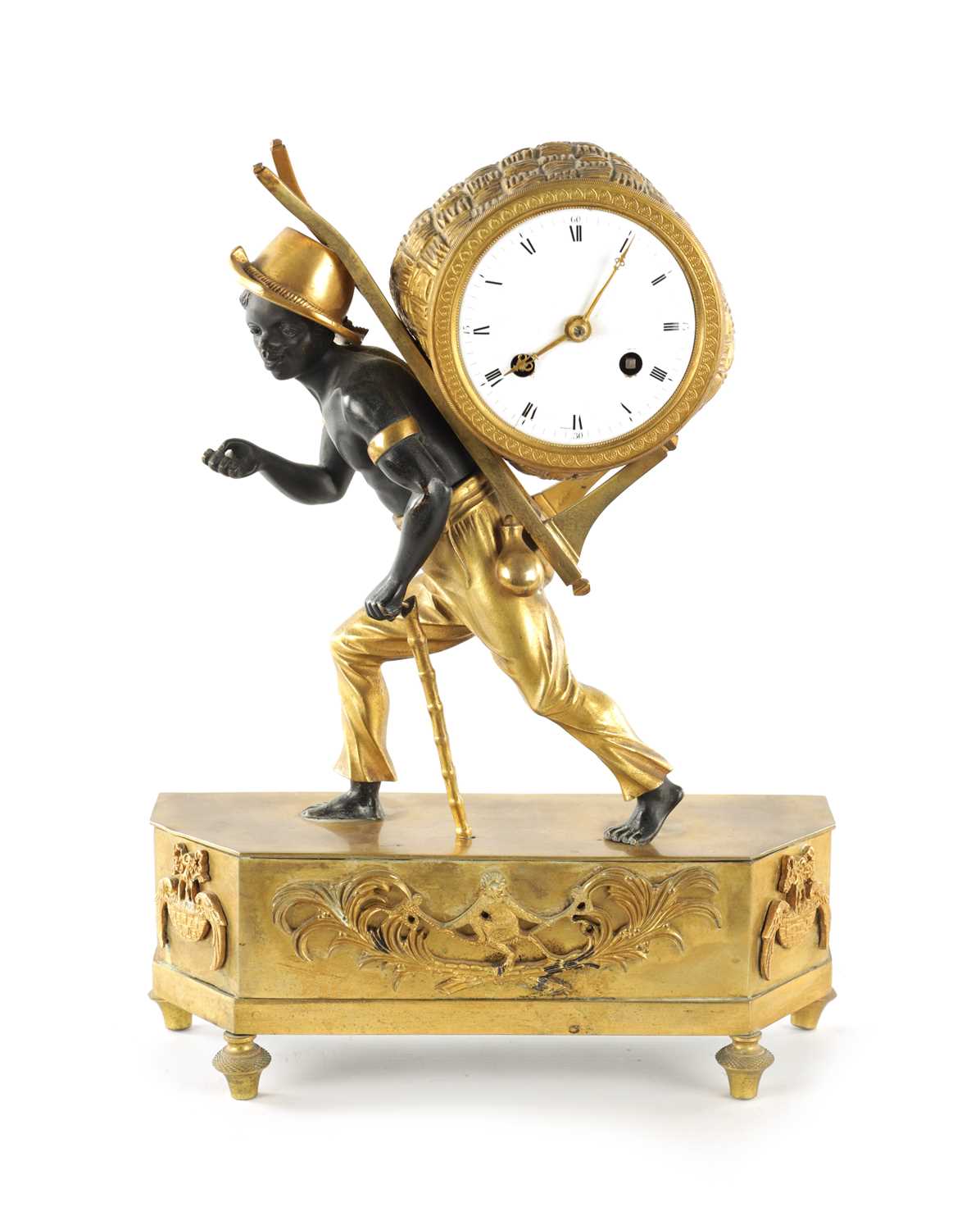 A FRENCH EMPIRE BRONZE AND ORMOLU BLACKAMOOR FIGURAL MANTEL CLOCK