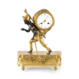 A FRENCH EMPIRE BRONZE AND ORMOLU BLACKAMOOR FIGURAL MANTEL CLOCK