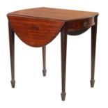 AN GEORGE III OVAL MAHOGANY PEMBROKE TABLE