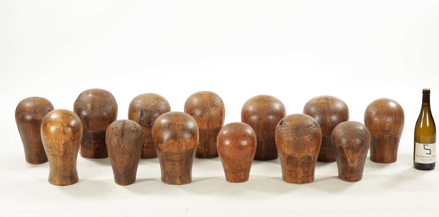 A COLLECTION OF THIRTEEN 19TH CENTURY WOODEN WIG STANDS - Image 2 of 9