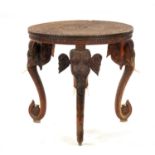 A 19TH CENTURY INDIAN CARVED HARDWOOD OCCASIONAL TABLE