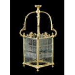 A 19TH CENTURY BRASS HANGING HALL LANTERN