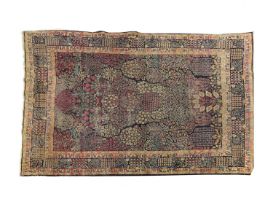 A LARGE ANTIQUE TABRIZ PERSIAN RUG