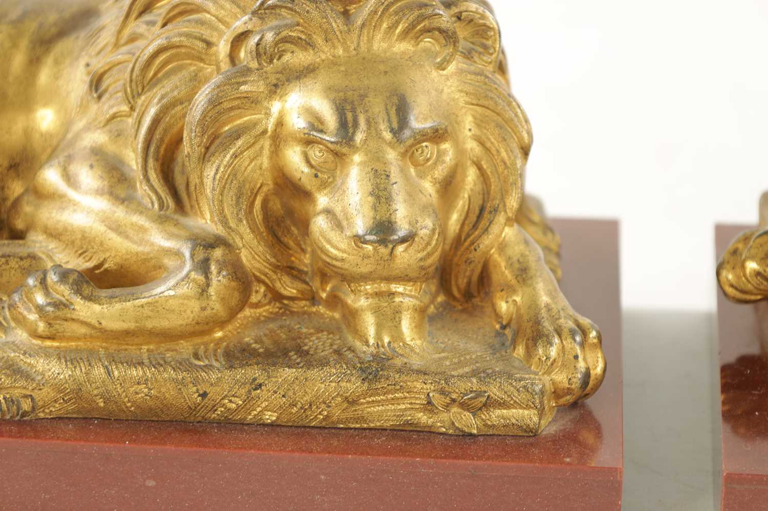 A PAIR OF LATE 19TH CENTURY GILT BRONZE RECUMBENT LIONS - Image 4 of 11