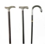 A COLLECTION OF THREE 19TH CENTURY SILVER TOPPED WALKING STICKS
