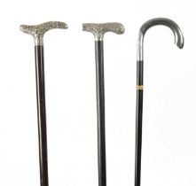 A COLLECTION OF THREE 19TH CENTURY SILVER TOPPED WALKING STICKS