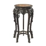 A 19TH CENTURY CHINESE CARVED HARDWOOD JARDINIERE STAND