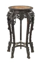 A 19TH CENTURY CHINESE CARVED HARDWOOD JARDINIERE STAND