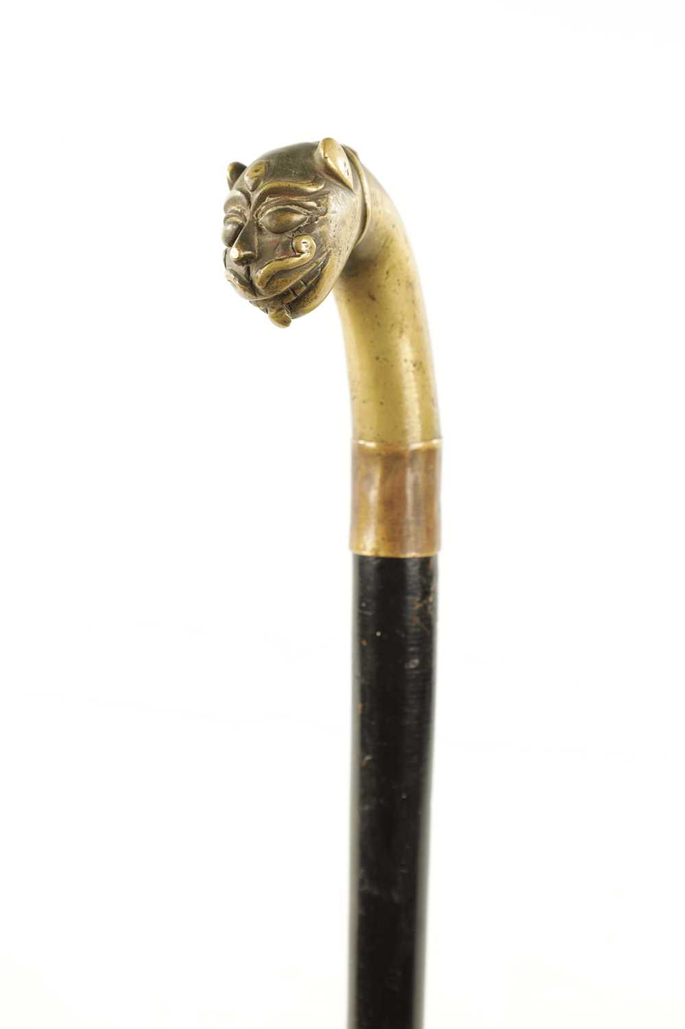 A 19TH CENTURY EUROPEAN BRASS HANDLE SWORD STICK