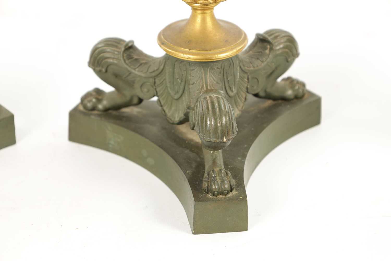 A PAIR OF REGENCY BRONZE AND ORMOLU CANDLESTICKS WITH LATER OIL LAMP FITTINGS - Image 3 of 12
