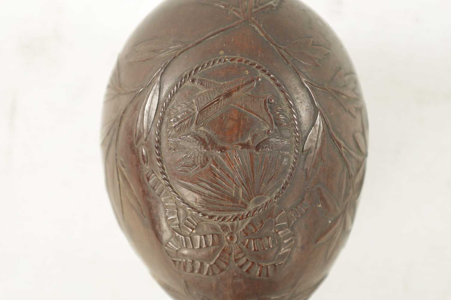 AN EARLY 19TH CENTURY EASTERN CARVED COCONUT BUGBEAR MONEYBOX - Image 3 of 4
