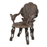 A 19TH CENTURY ANGLO-INDIAN CARVED HARDWOOD ARMCHAIR