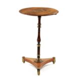 A REGENCY ROSEWOOD BRASS MOUNTED CIRCULAR TOP INLAID OCCASIONAL TABLE