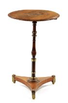 A REGENCY ROSEWOOD BRASS MOUNTED CIRCULAR TOP INLAID OCCASIONAL TABLE