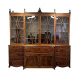 A FINE GEORGE III SHERATON DESIGN INLAID MAHOGANY BREAKFRONT BOOKCASE