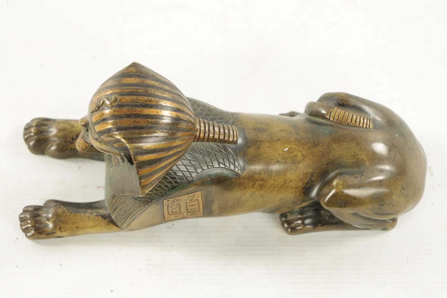 A 19TH CENTURY FRENCH EGYPTIAN REVIVAL BRONZE FIGURE OF A SEATED SPHINX - Image 4 of 7