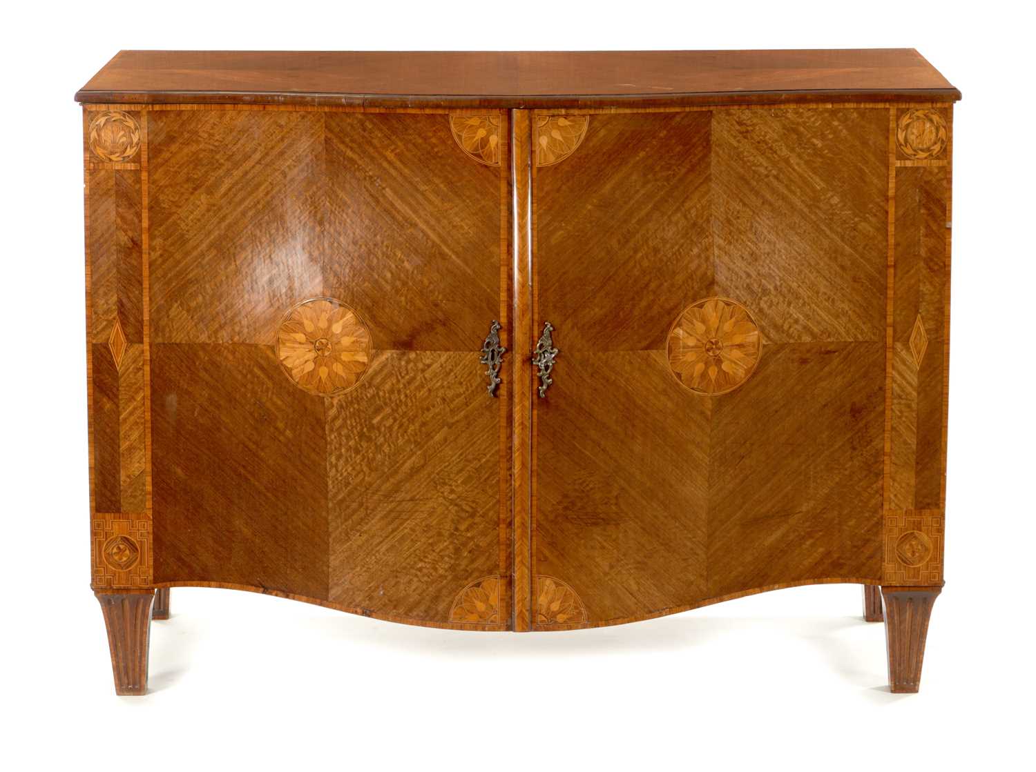 A FINE AND IMPORTANT GEORGE III SERPENTINE TULIPWOOD AND MARQUETRY MAHOGANY COMMODE ATTRIBUTED TO CH