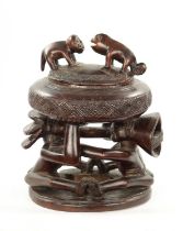 A CARVED HARDWOOD LUBA DUAL DIVINATION LIDDED CUP