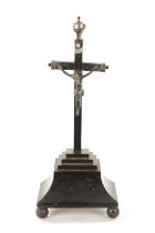 A 19TH CENTURY EBONISED AND SILVER MOUNTED CORPUS CHRISTI CLOCK