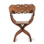 A 19TH CENTURY INDIAN HARDWOOD AND BRASS INLAID FOLDING SAVONAROLA ARMCHAIR