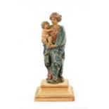 AN EARLY 18TH CENTURY POLYCHROME CARVING OF MADONNA AND CHILD