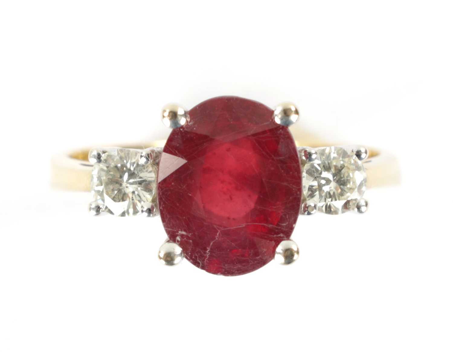 AN 18CT GOLD RUBY AND DIAMOND RING