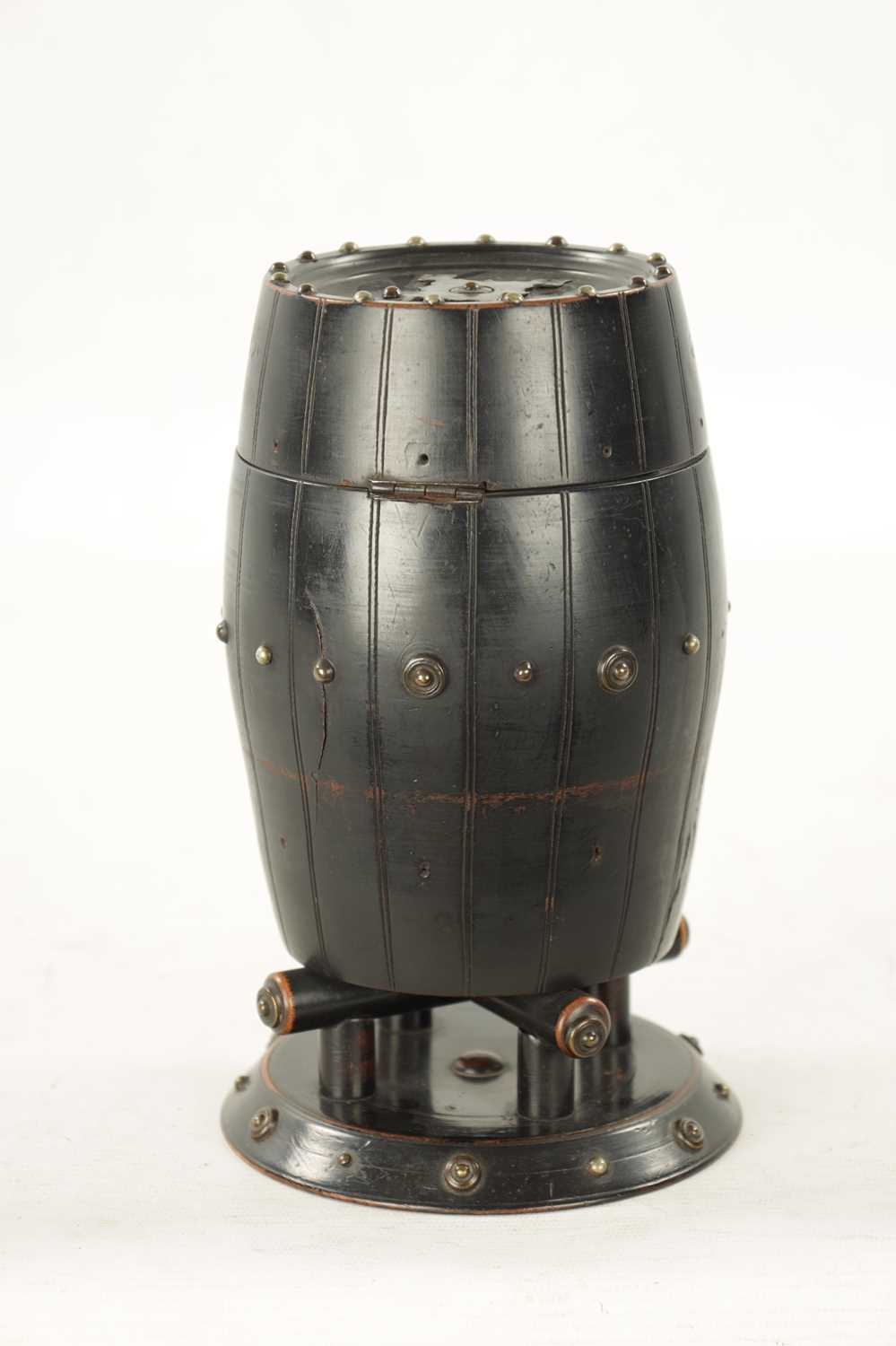 A 19TH CENTURY EBONISED CARVED WOOD TEA CADDY IN THE FORM OF A BARREL - Image 6 of 7