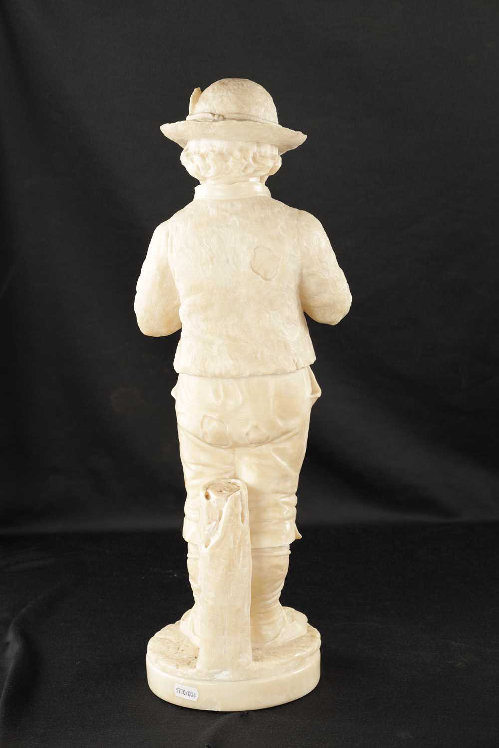 A 19TH CENTURY CARVED ALABASTER FIGURE OF A BOY PLAYING AN INSTRUMENT - Image 7 of 9
