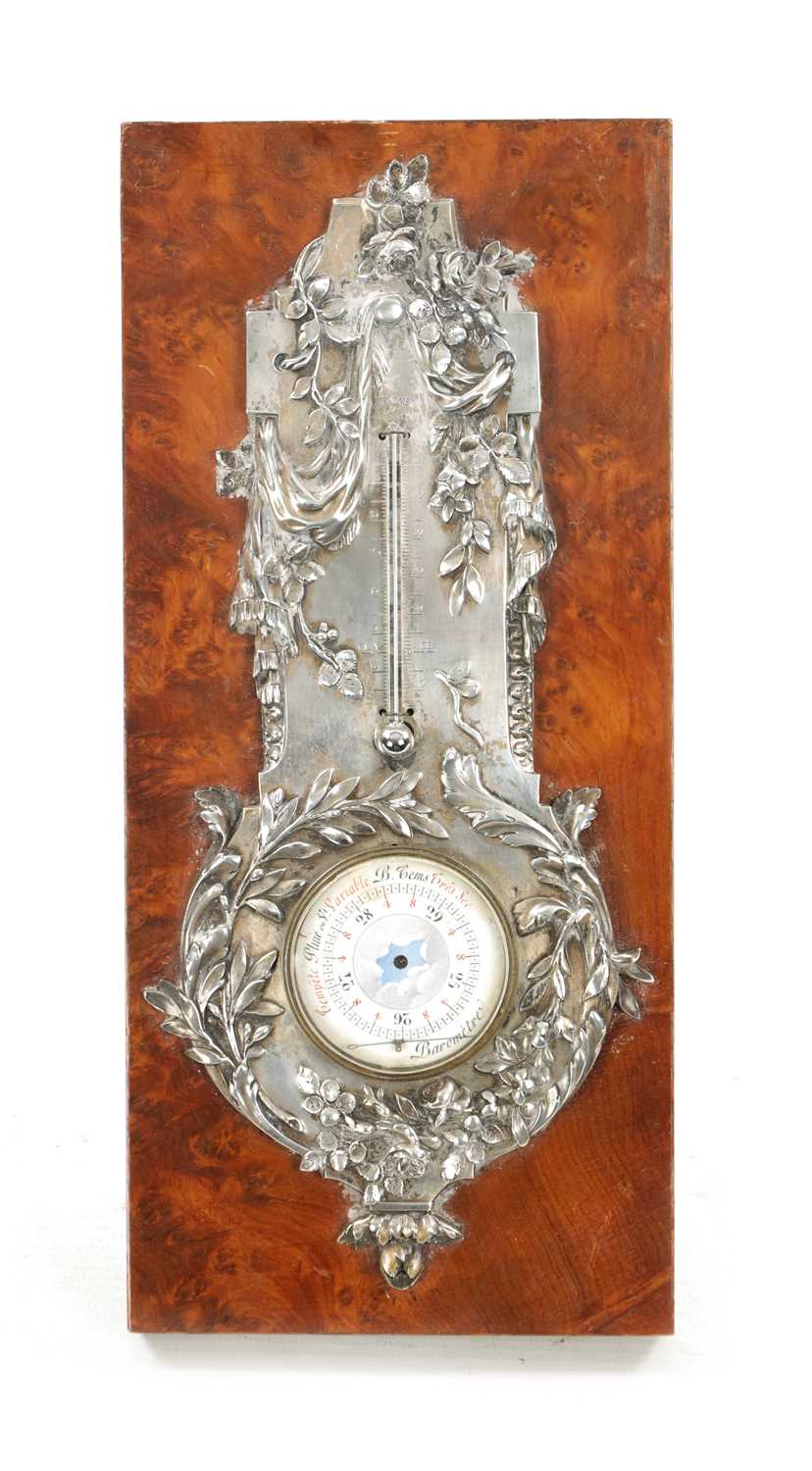AN EARLY 20TH CENTURY SILVERED BRONZE BAROMETER