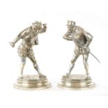 EMILE GUILLEMIN. A PAIR OF SILVERED BRONZE SCULPTURES DEPICTING CAVALIERS