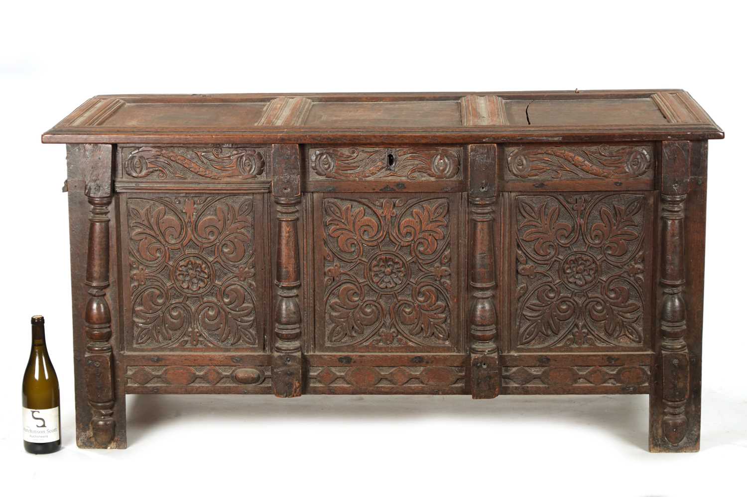 A 17TH CENTURY CARVED OAK THREE PANELLED FRONT COFFER - Image 2 of 8