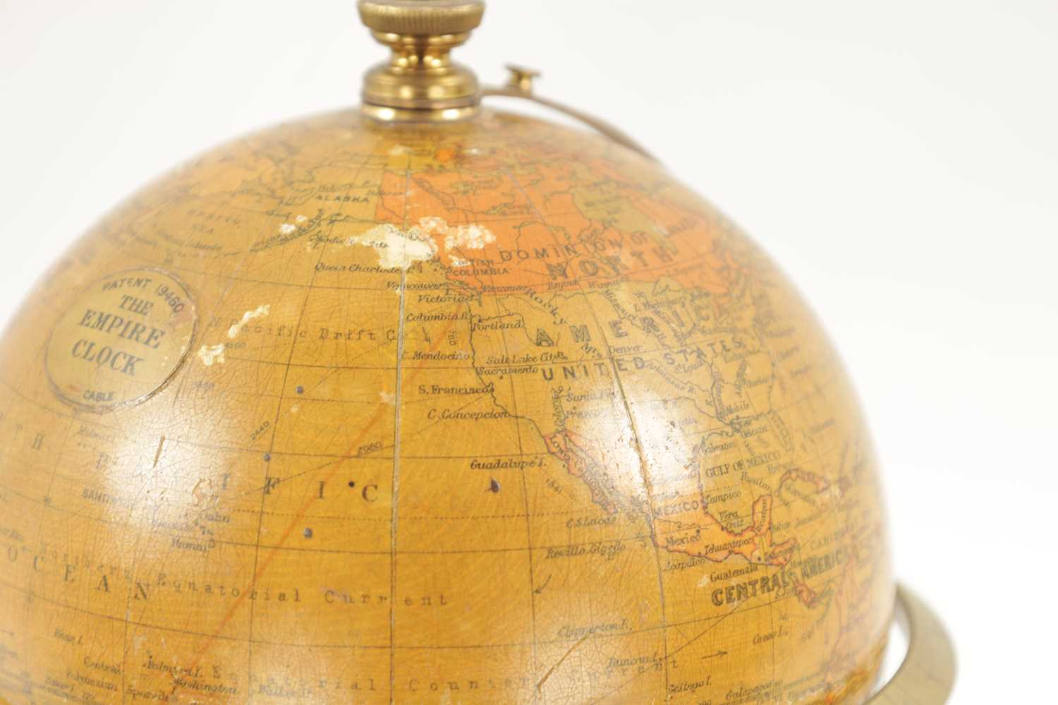 AN EARLY 20TH CENTURY SMITH & SONS LTD 'THE EMPIRE CLOCK' ROTATING GLOBE CLOCK - Image 4 of 9