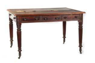 A WILLIAM IV MAHOGANY LIBRARY TABLE OF SMALL SIZE