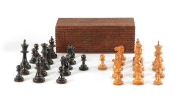 A 19TH CENTURY CARVED WOODEN CHESS SET