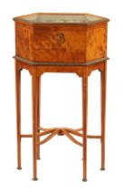 A FINE EARLY 20TH CENTURY FIGURED SATINWOOD HEXAGONAL MANICURE CABINET