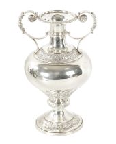 AN EARLY 20TH CENTURY SILVER BULBOUS TWO-HANDLED VASE