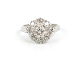 AN 18CT WHITE GOLD DIAMOND CLUSTER RING