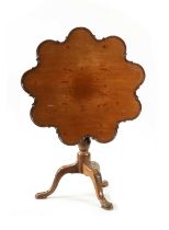 A GEORGE III MAHOGANY TILT TOP TABLE