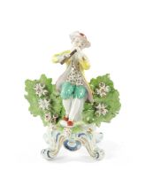 A 19TH CENTURY PORCELAIN FIGURE POSSIBLY BOW OF A FLUTE PLAYER